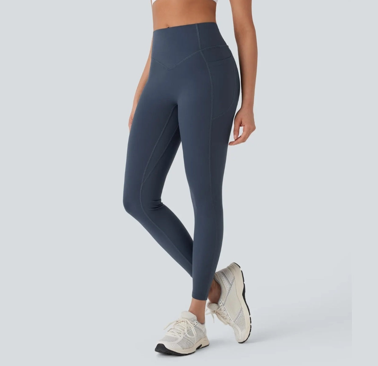 High-waisted yoga pants with a V-shaped waistline design that cinches the waist.