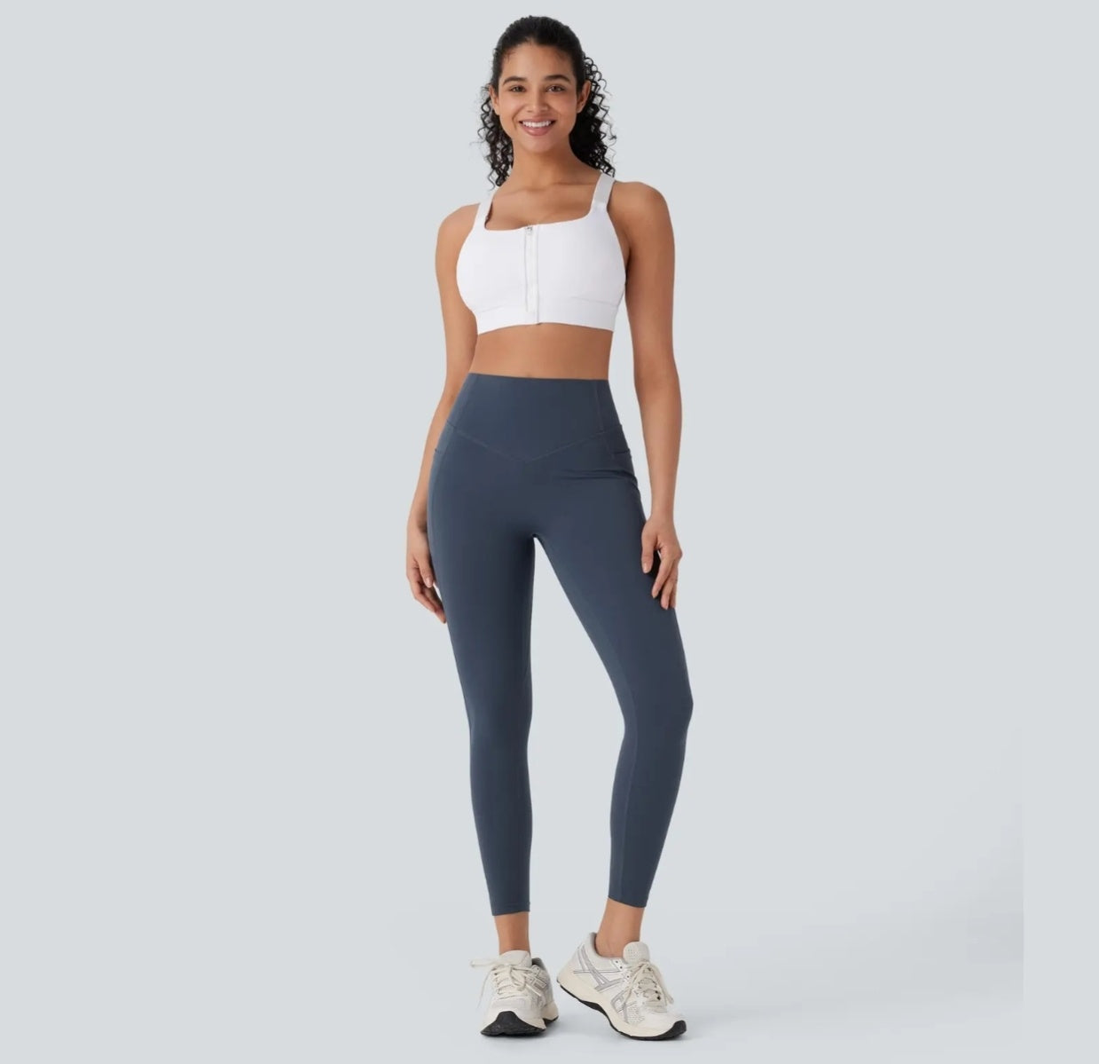 High-waisted yoga pants with a V-shaped waistline design that cinches the waist.